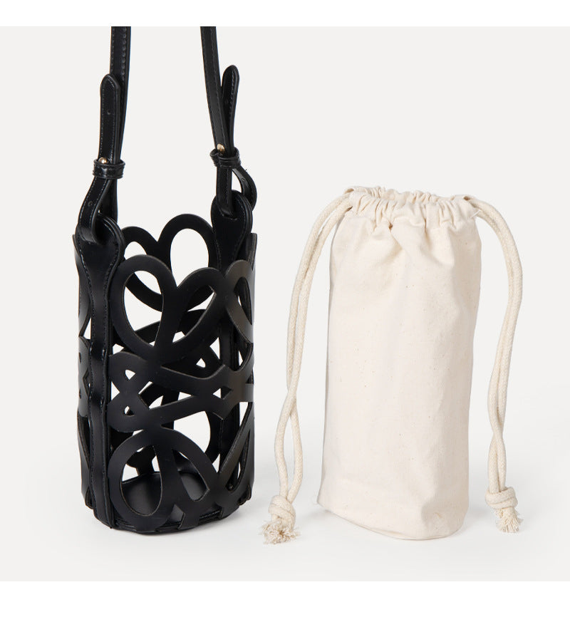(WD3902) Niche Design Hollow Drawstring Canvas Cylinder Small Bag Personality Retro Crossbody
