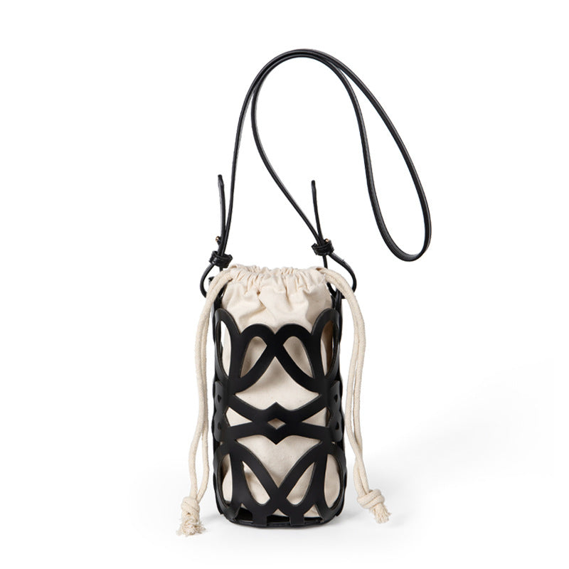 (WD3902) Niche Design Hollow Drawstring Canvas Cylinder Small Bag Personality Retro Crossbody
