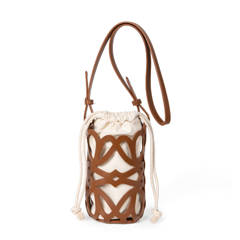 (WD3902) Niche Design Hollow Drawstring Canvas Cylinder Small Bag Personality Retro Crossbody
